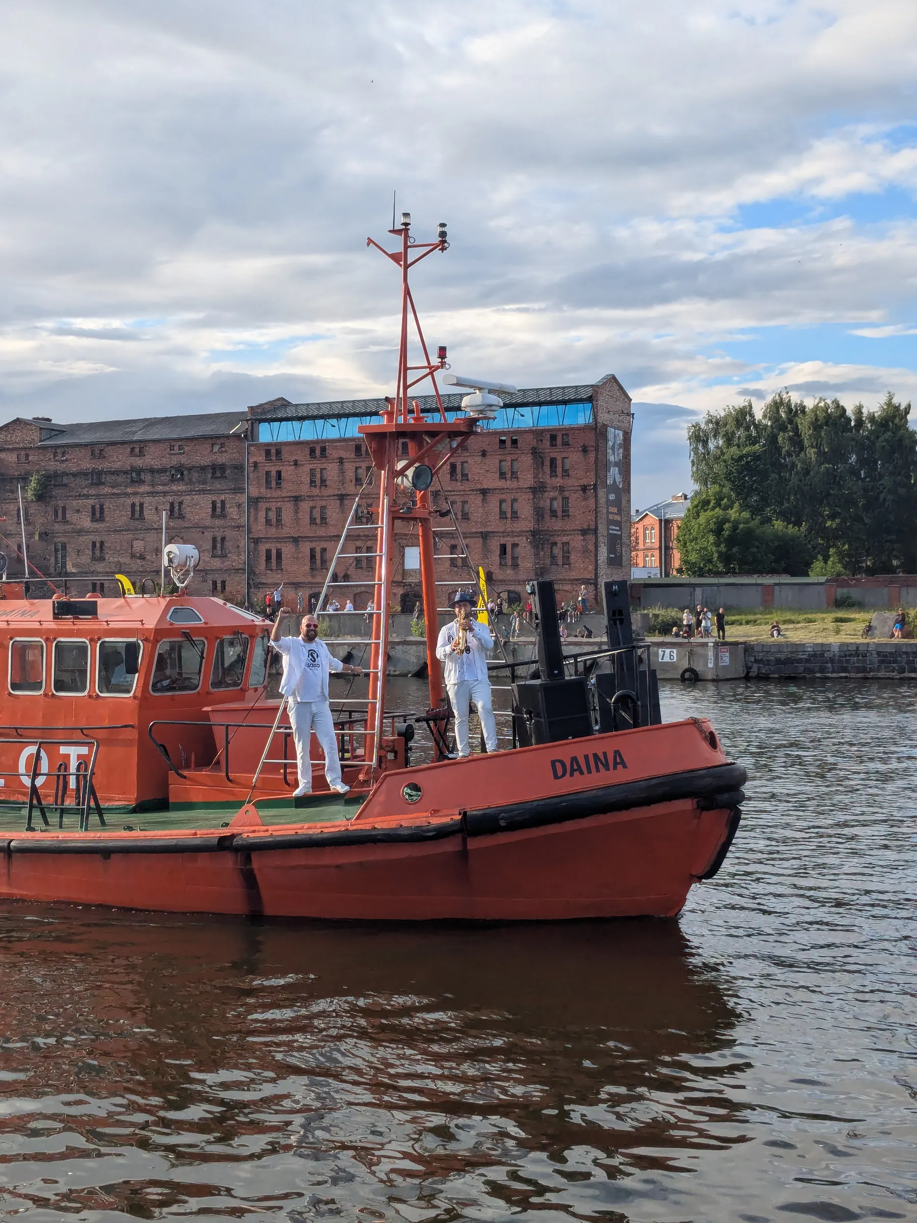 A red boat taking part in Liepāja's maritime festival on the canal