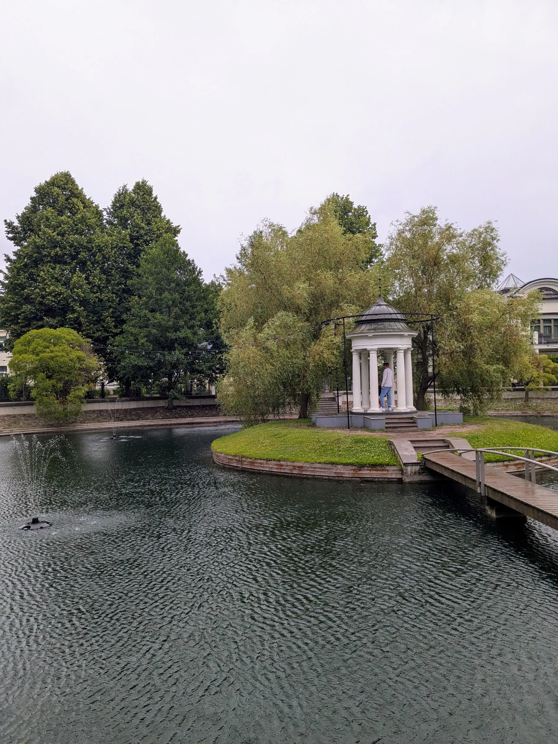 The Swan Pond and white pavilion in Liepāja Seaside Park