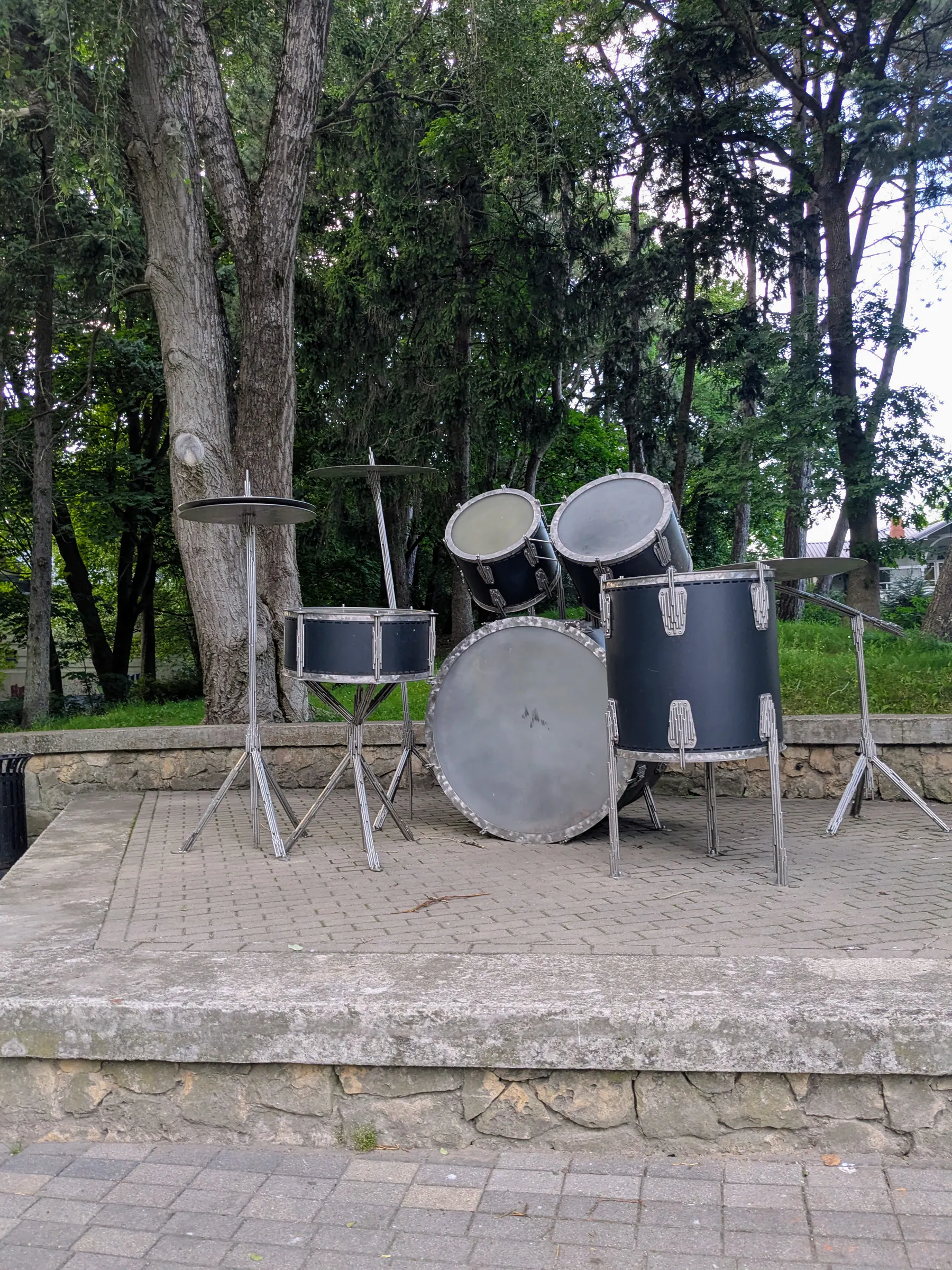 A large metal drum-set sculpture in Liepāja Seaside Park