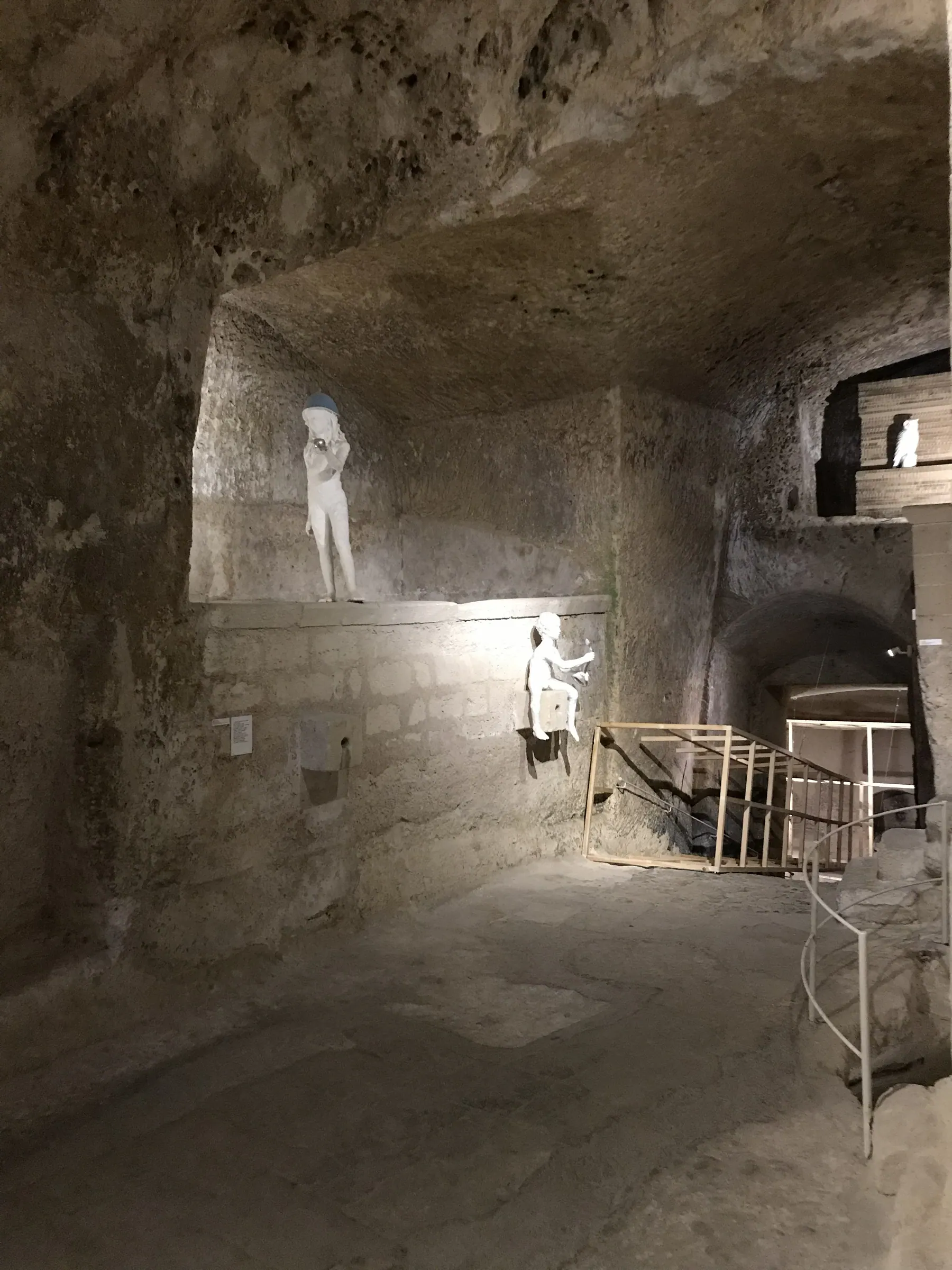 Sculpture displayed in a cave gallery at MUSMA