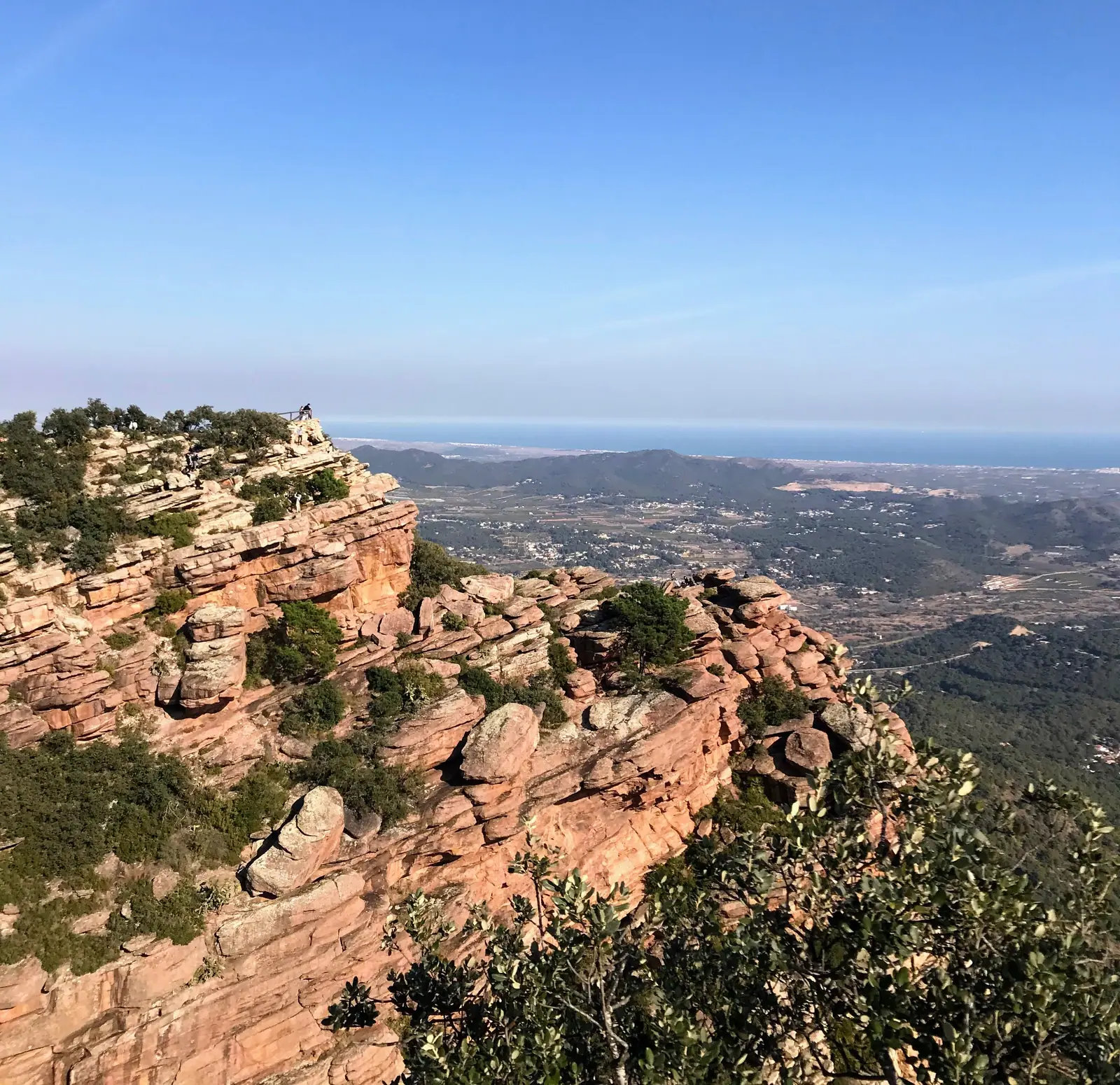Red sandstone cliffs and the Mediterranean landscape from Sierra Calderona